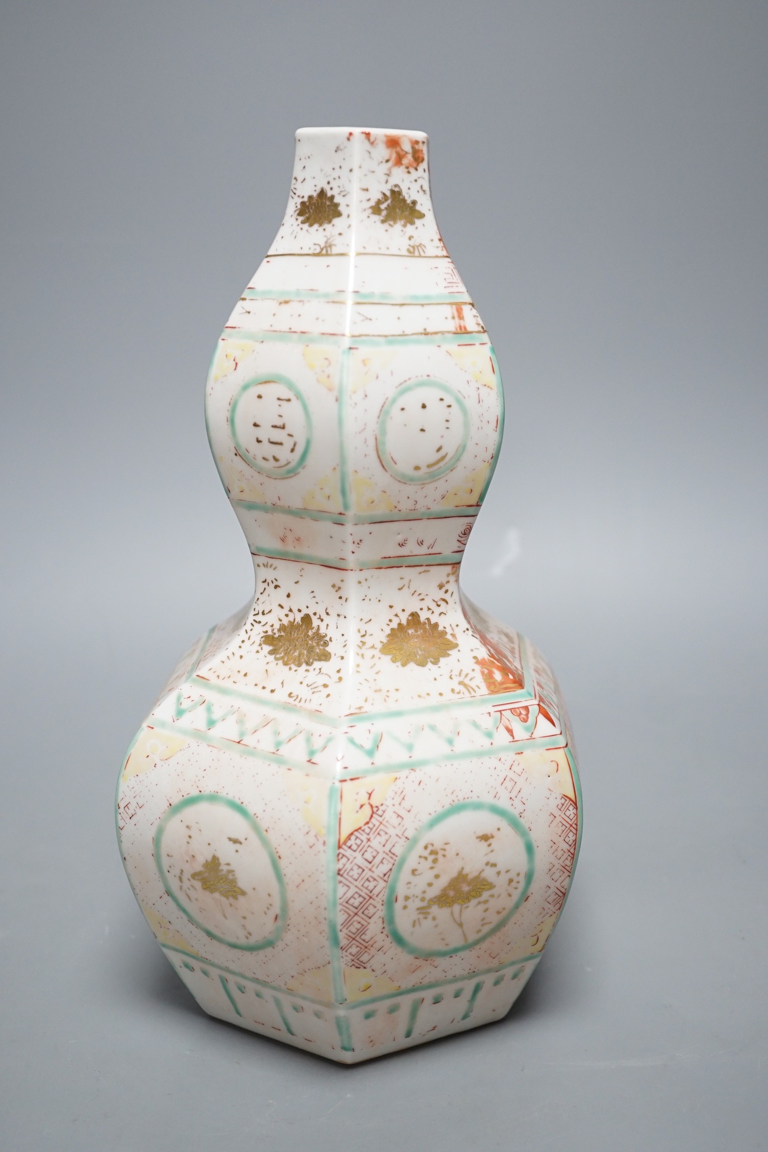 A Chinese famille rose gourd hexagonal shaped vase, Ming style, 28cm tall